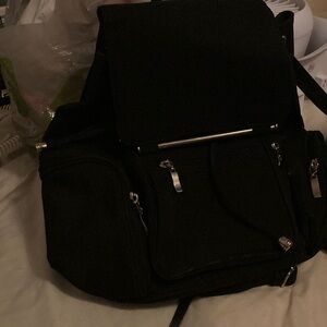 Sleek Black Backpack with Structured Design and Versatile Use